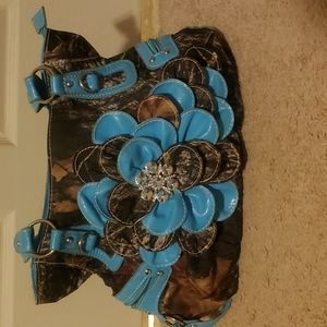 Camouflage and blue pocketbook